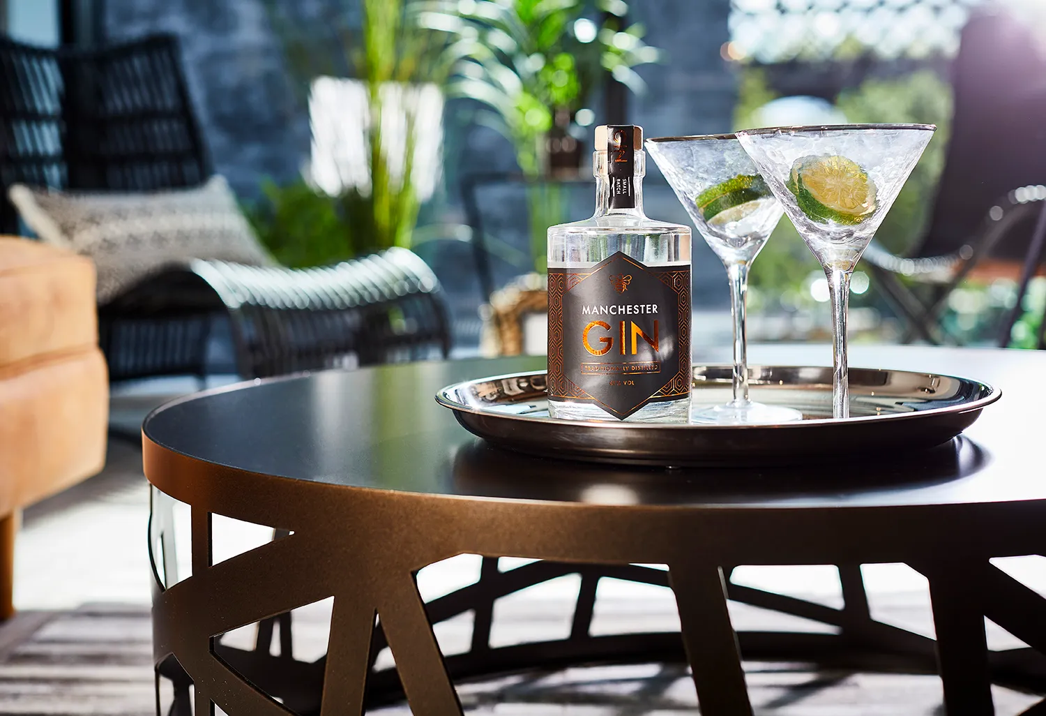 Manchester Gin and martini glasses on a tray on the apartment terrace